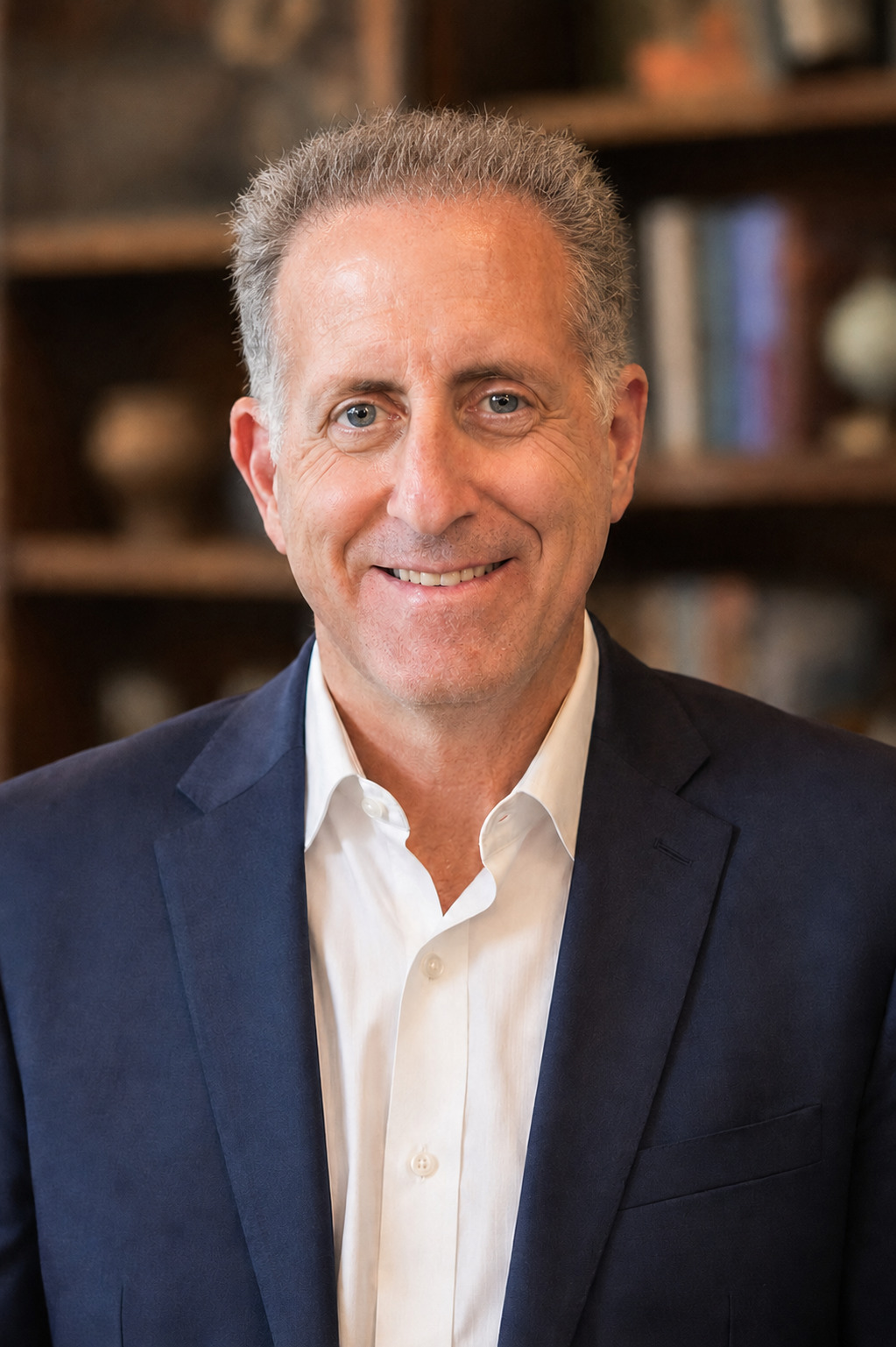 Scott Silverman smiling in his office